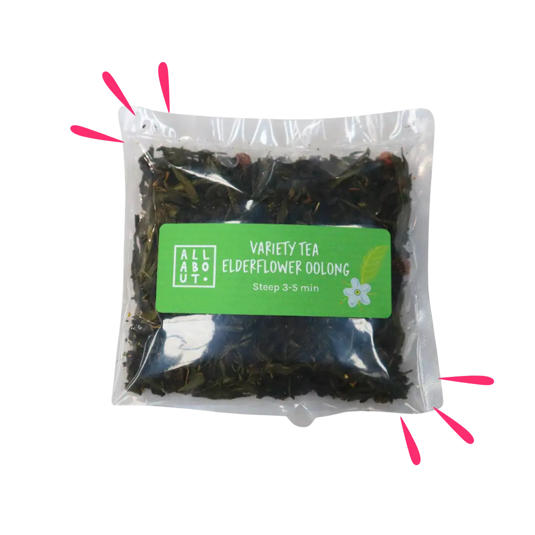 All About Kombucha variety tea pouch labeled Elderflower Oolong in a clear 3–5 minute steeping pack with green label, showing loose tea leaves and floral ingredients

