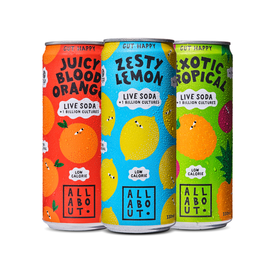Three Live Soda cans in Blood Orange, Lemon and Tropical flavours featuring playful fruit illustrations and vibrant flavour labels.
