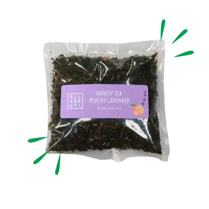 All About Kombucha variety tea pouch labeled Peachy Lavender in a clear 3–5 minute steeping pack with purple label and illustrated peach